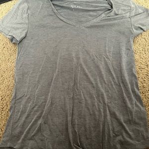 A gray short sleeve t-shirt. Worn a few times.
